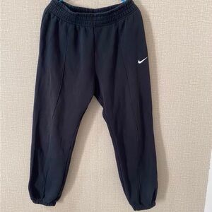 Nike Kids Black Jogger Sweatpants with White Swoosh